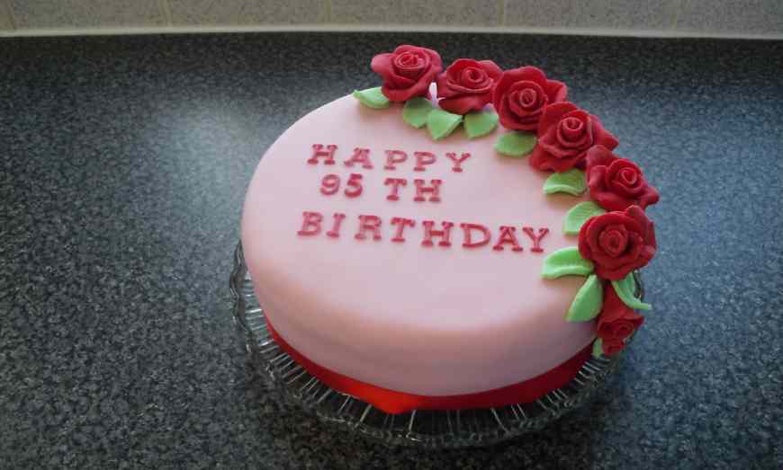 Birthday cake with red roses